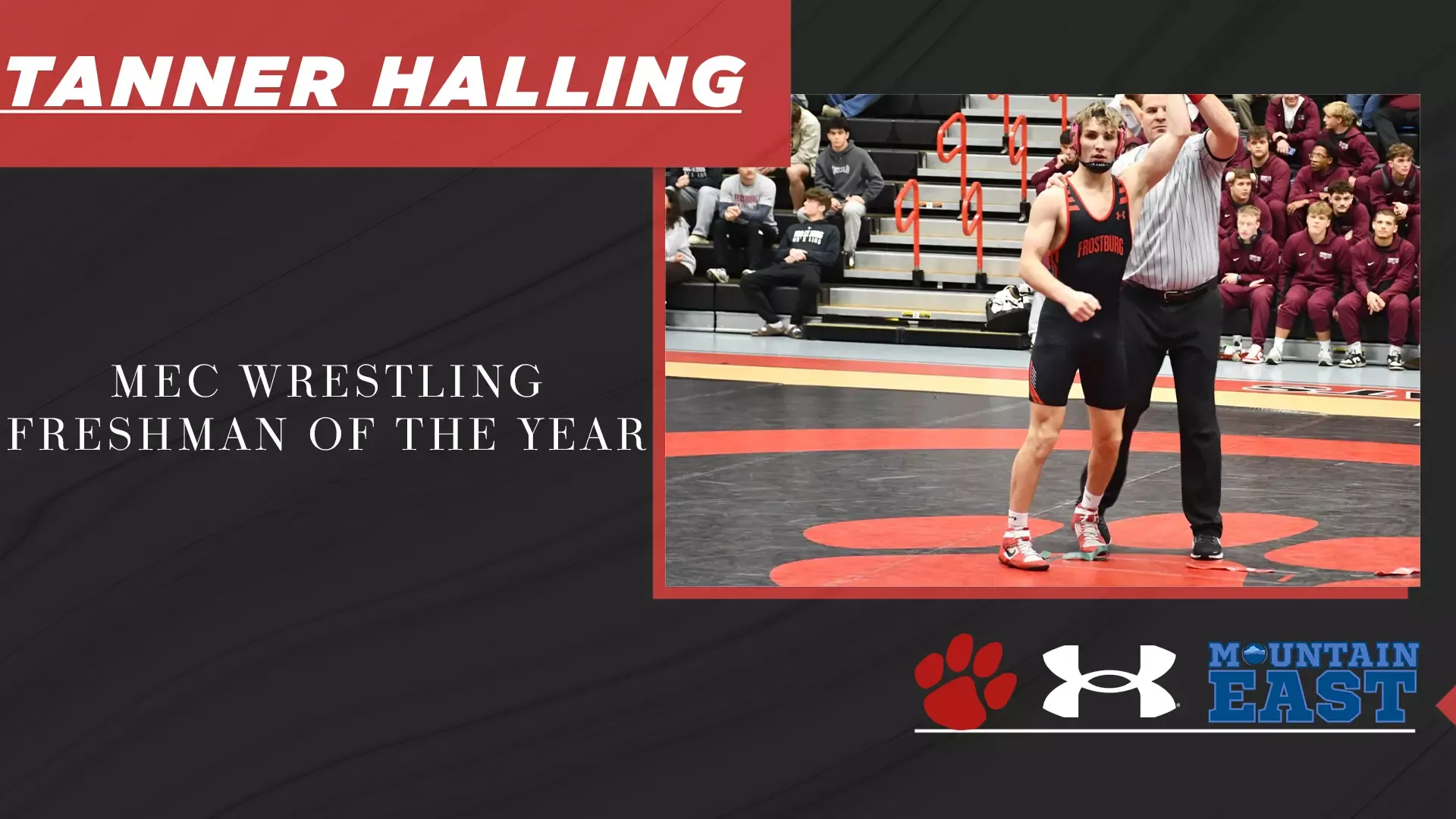 MEC Wrestling Freshman of the Year, Tanner Halling, standing with the ref, holding arm up, sponsored by Under Armour, Frostburg and Mountain East Logo. 