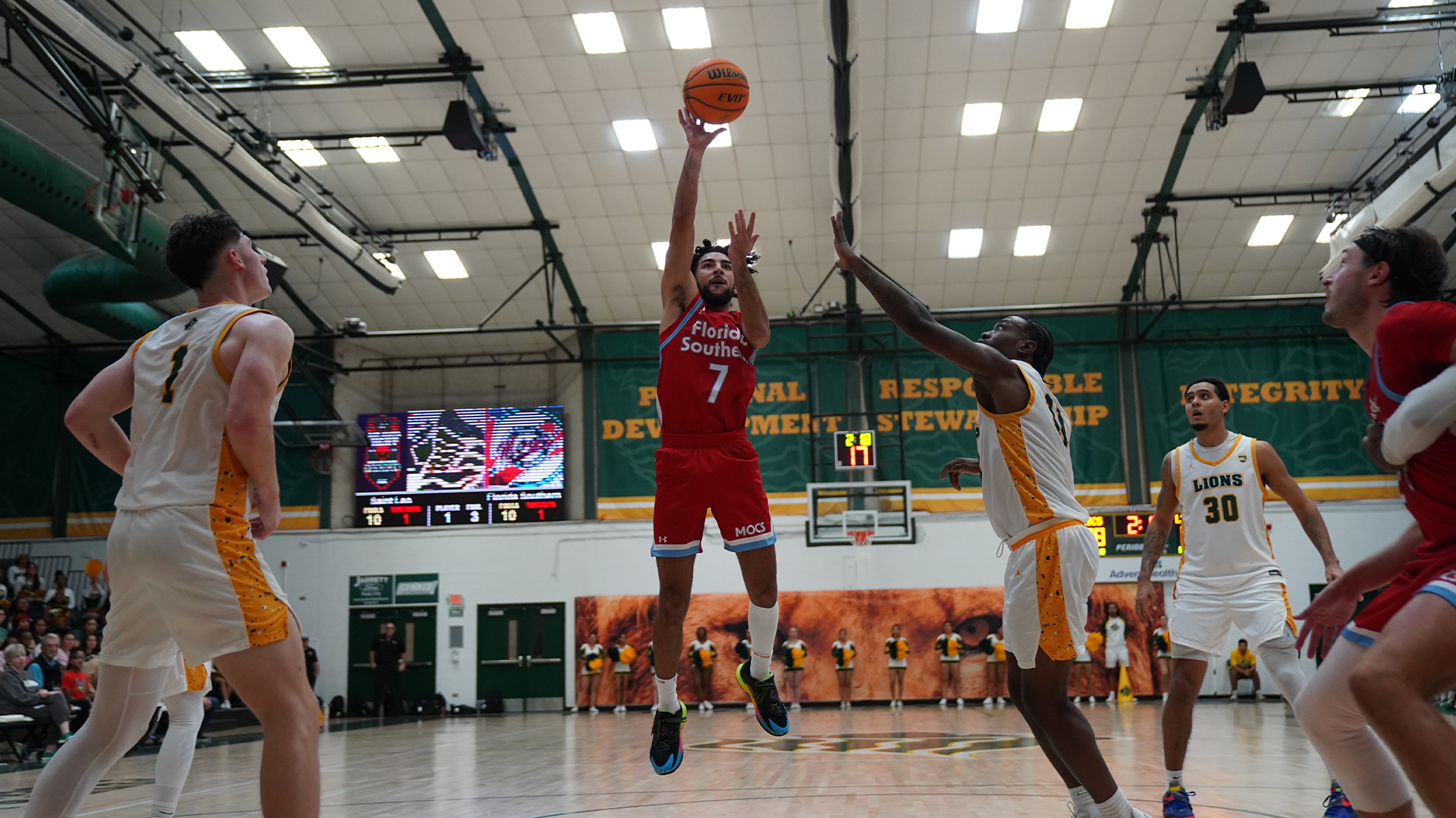 Ameer Ramadan driving layup in the paint