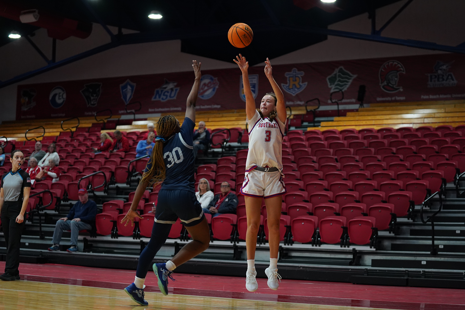 Lily Randgaard shooting a three against PBA
