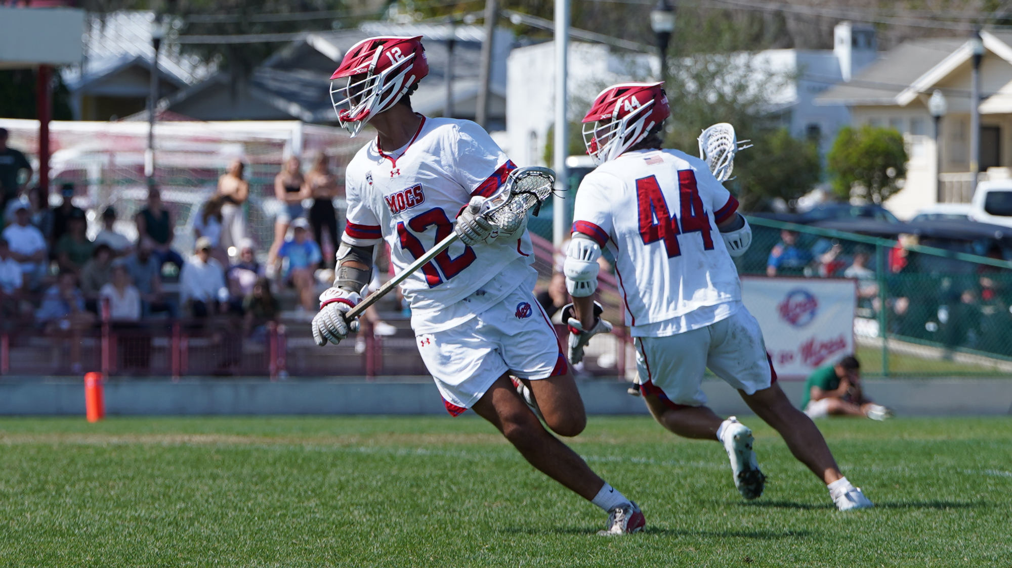 Nolan Tighe carries the ball versus Concordia University Irvine