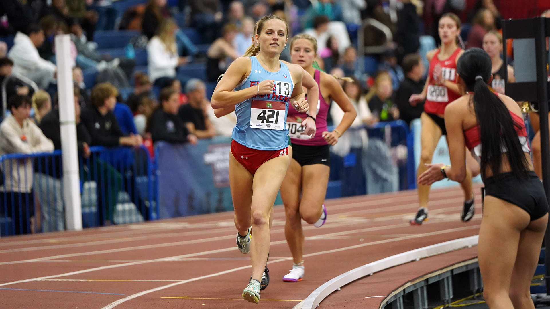 Grace Reed competing in the mile in Gainesville