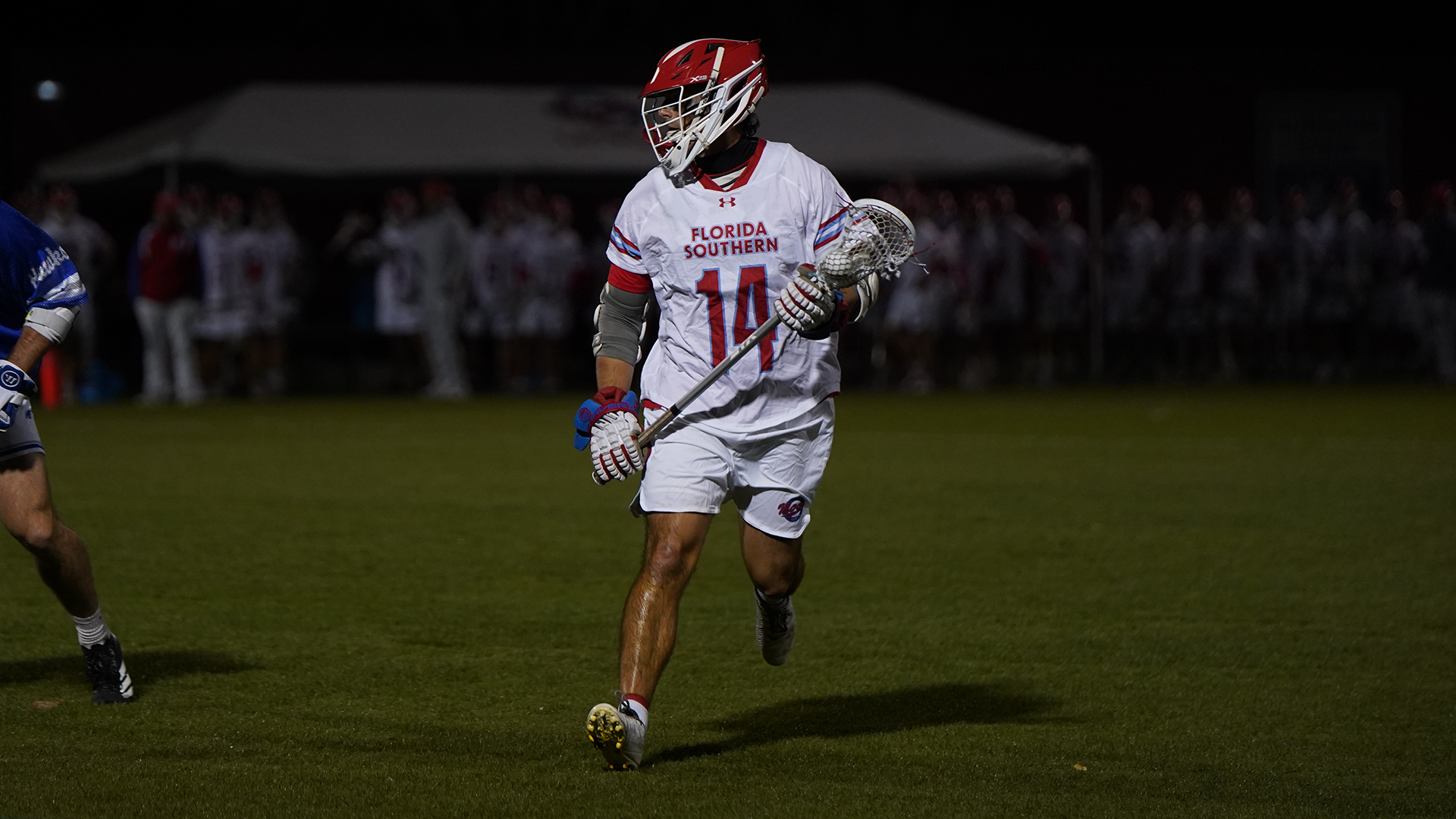 Caiden Wiech cradles the ball versus Rockhurst