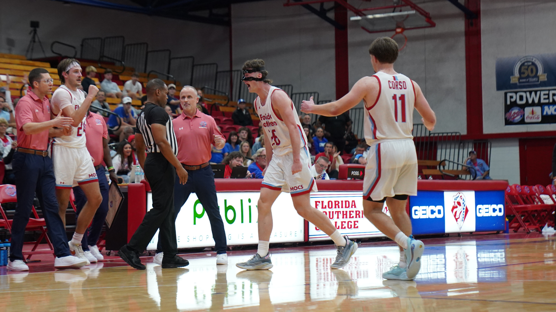 Charlie Dalton celebrating with bench