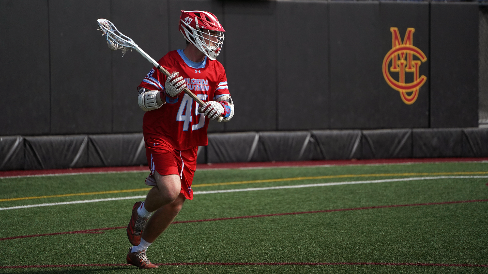Angus Walko holds the ball versus Adams State