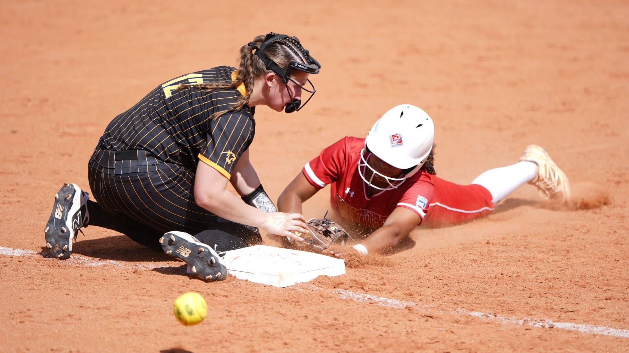 Gigi Polanco Sliding into Third Versus Adelphi