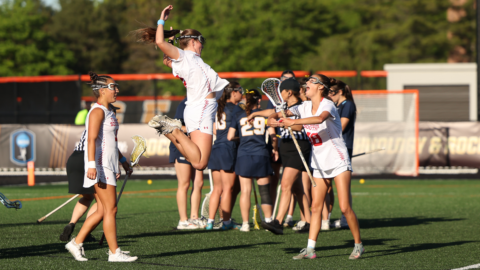 Moccasins celebrate a goal in the National Semifinal victory over Pace
