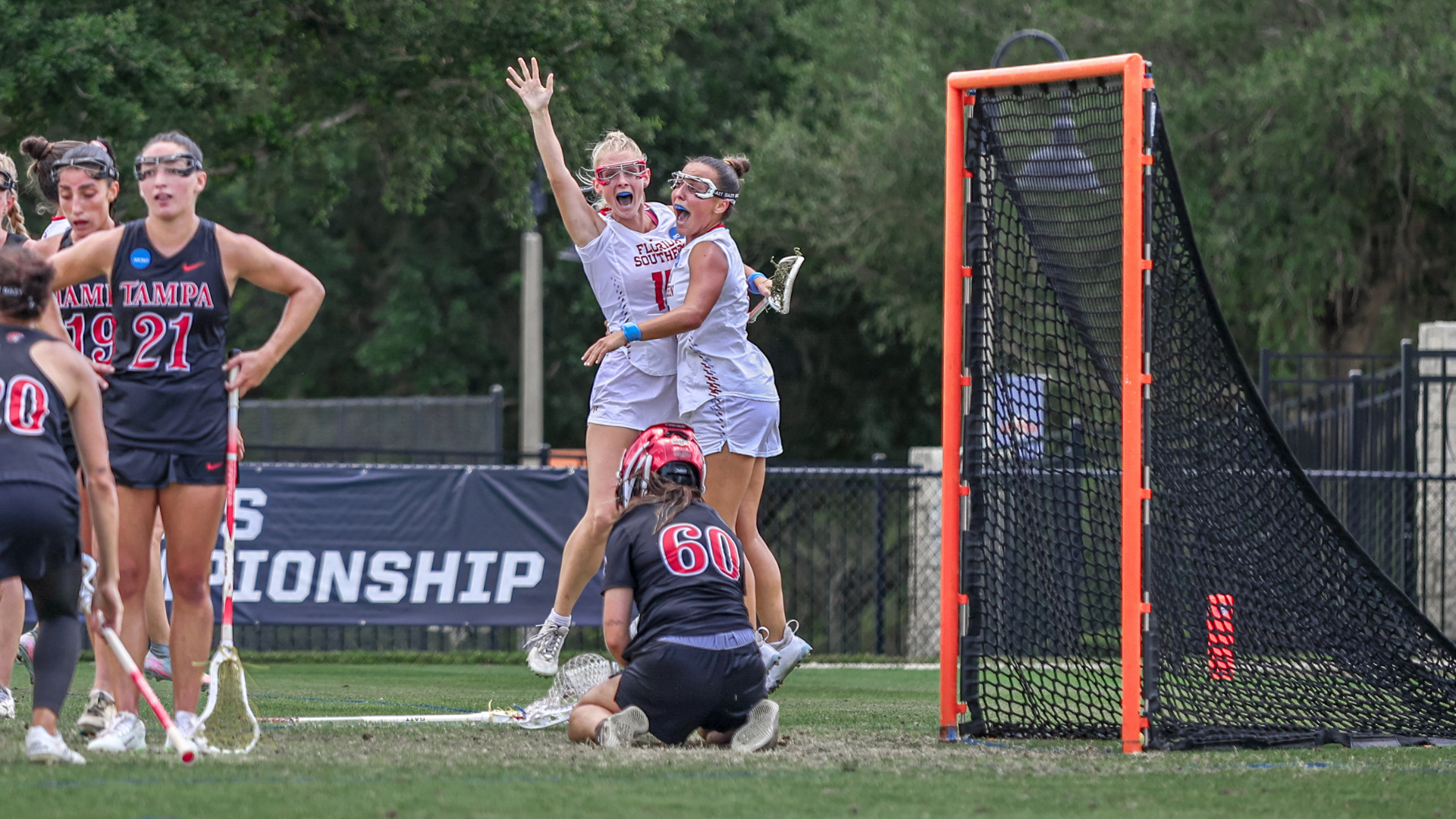 Cohen and Bennett celebrate OT Goal in NCAA Second Round