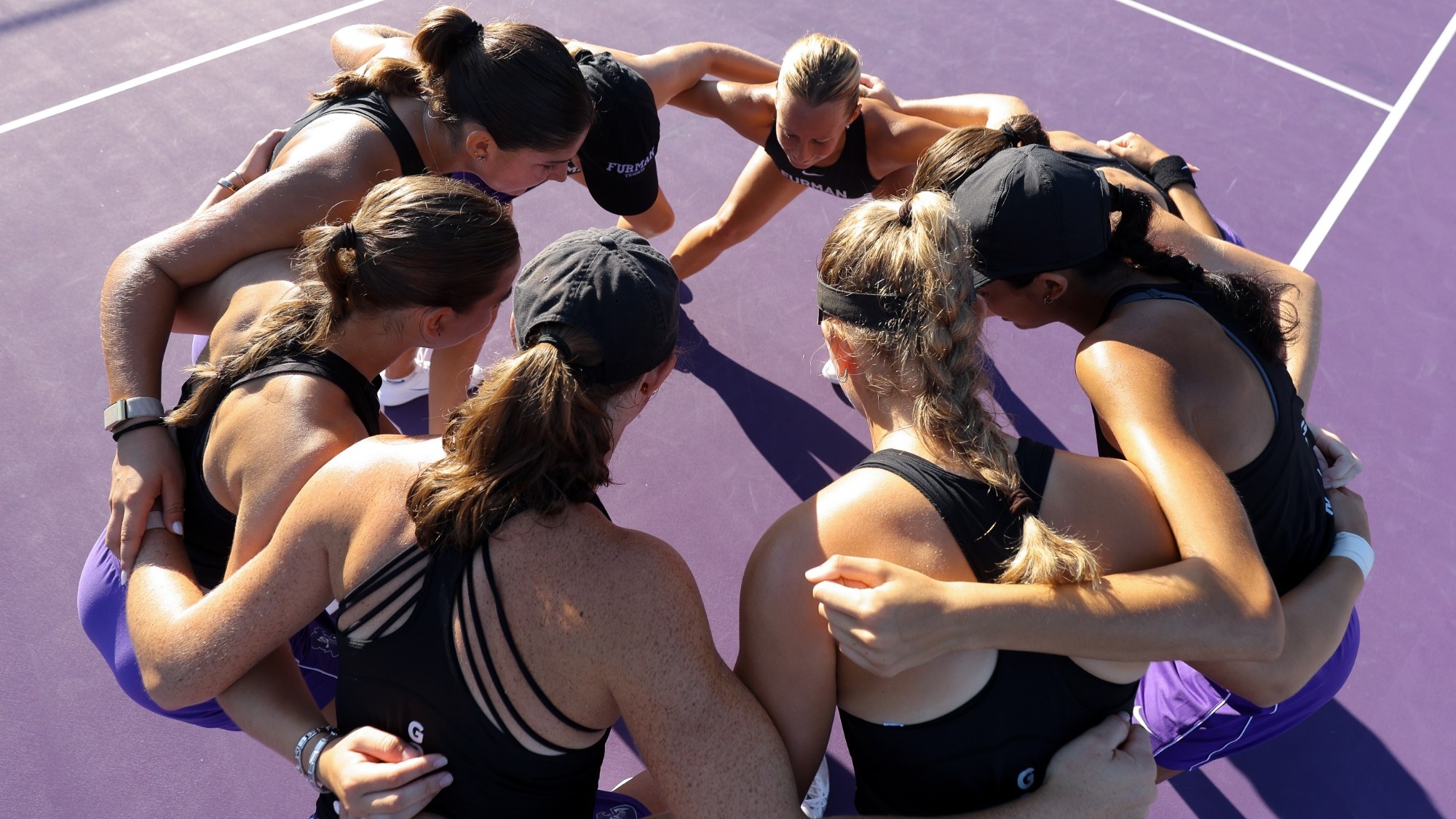Women's tennis huddle