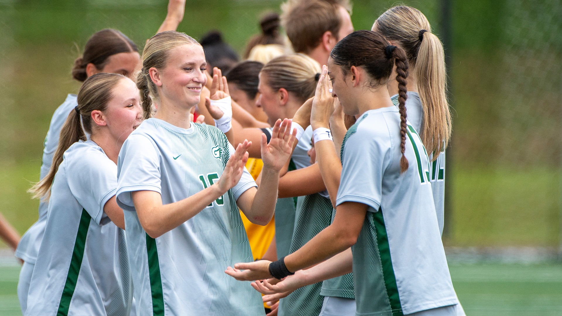 26_WSOC_StartinglineuphandshakeWCU