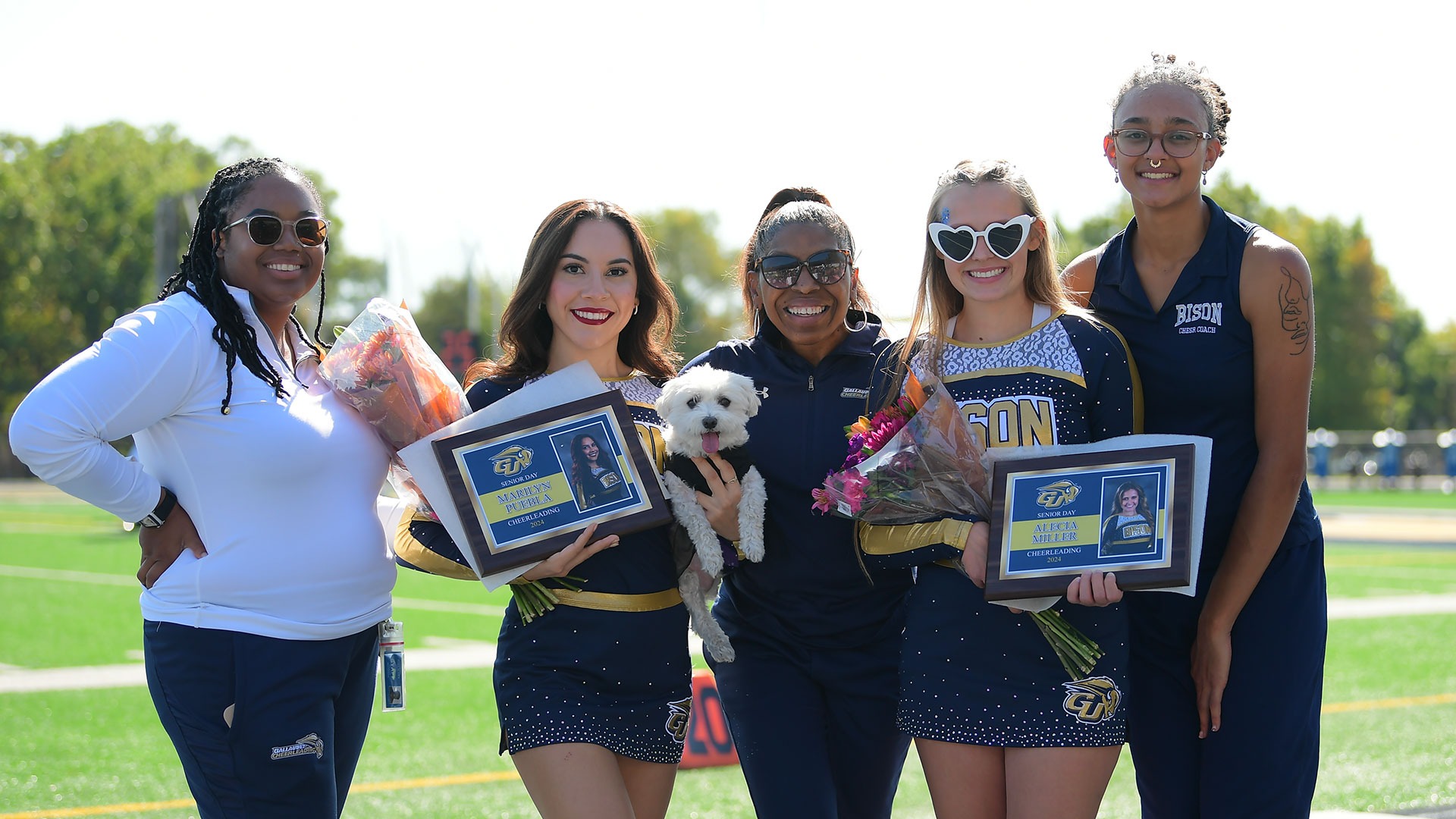 Gallaudet Fall Cheerleader Seniors with the Coaching Staff on a sunny afternoon for Senior Day