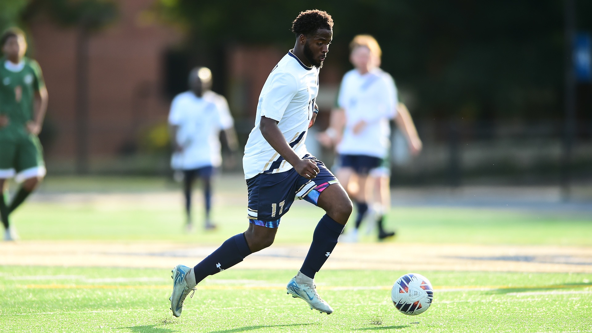 Gallaudet's men soccer Andrew Riebe made the dribble at Hotchkiss Field during Tristan Torbett Kickoff Classic