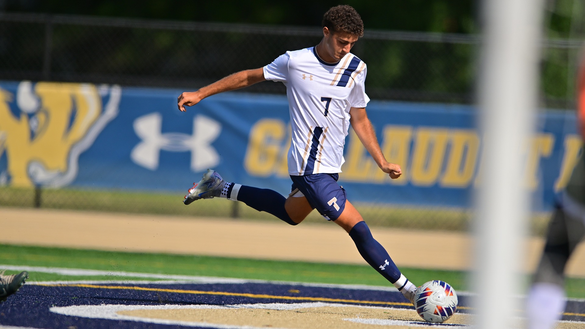 Gallaudet's men soccer Matteo Giansanti attempts kick the ball at Hotchkiss Field during Tristan Torbett Kickoff Classic