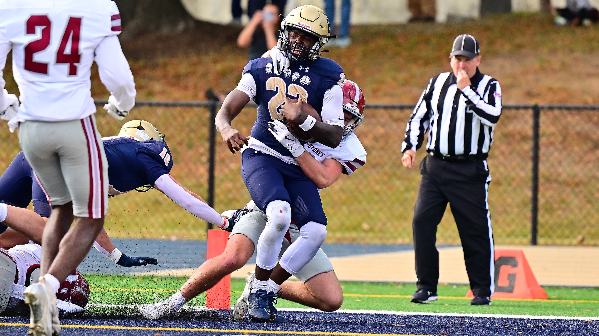 Gallaudet running back Dakota Fisher scores a touchdown against Hampden-Sydney on Saturday, Nov. 1, in Washington, D.C. on Hotckiss Field on a sunny afternoon. A H-SC defender tackles Fisher in the end zone.