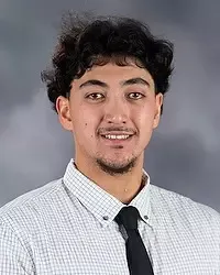Gallaudet University men's basketball student assistant Brandon Chung headshot photo. He is wearing  a white button down shirt and black tie against a grey background.