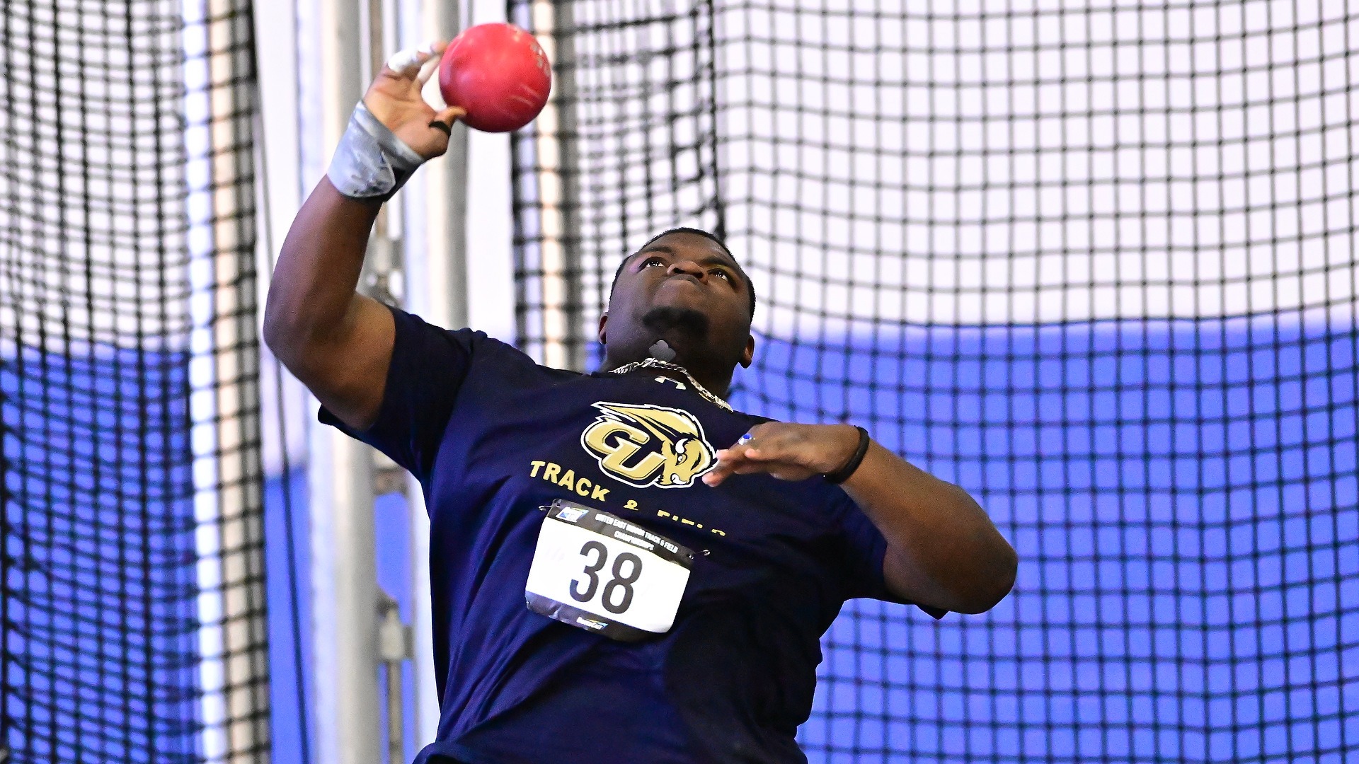 Gallaudet thrower Navar Harris attempts to throw the shotput in close up