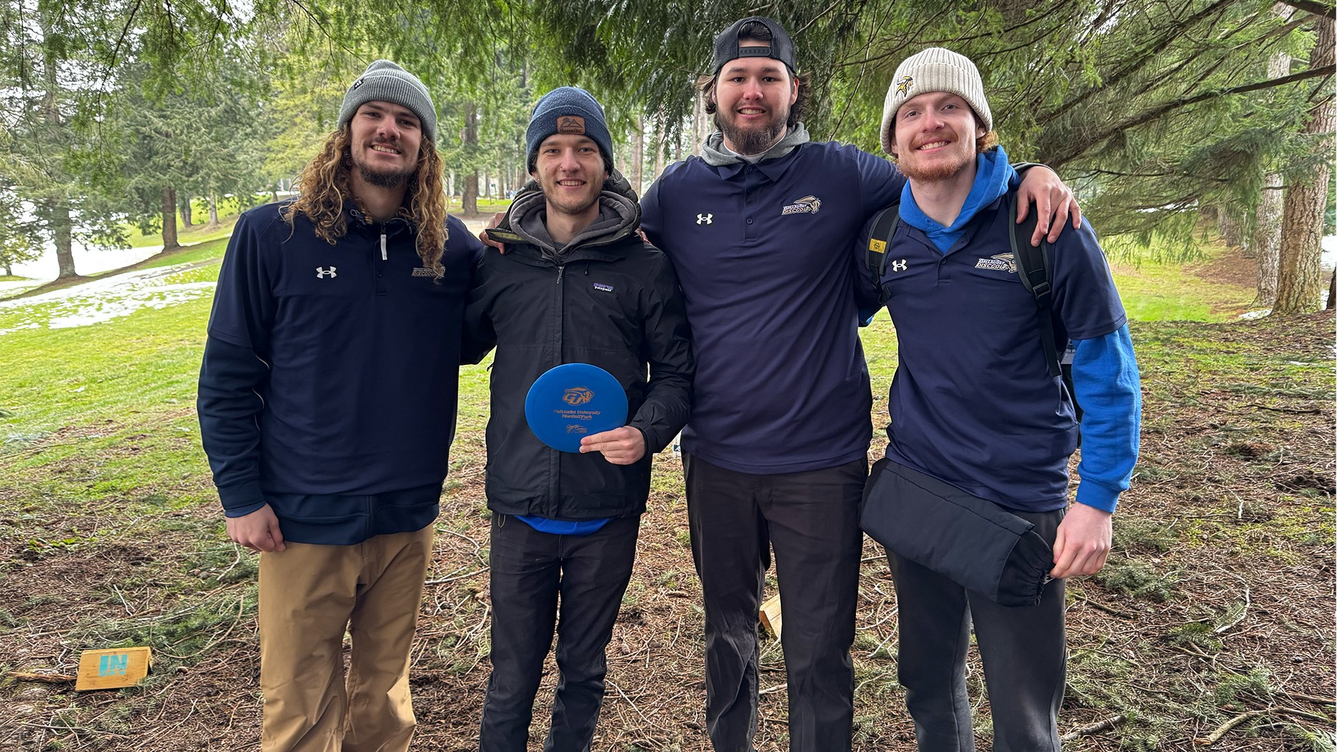 Four disc golfers took the group picture at Hills at Portal Golf Club in B.C. Canada