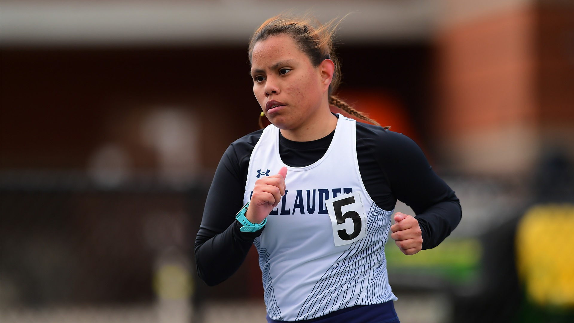 Gallaudet women's runner Olivia Armstrong ran during an Bison Classic outdoor meet.