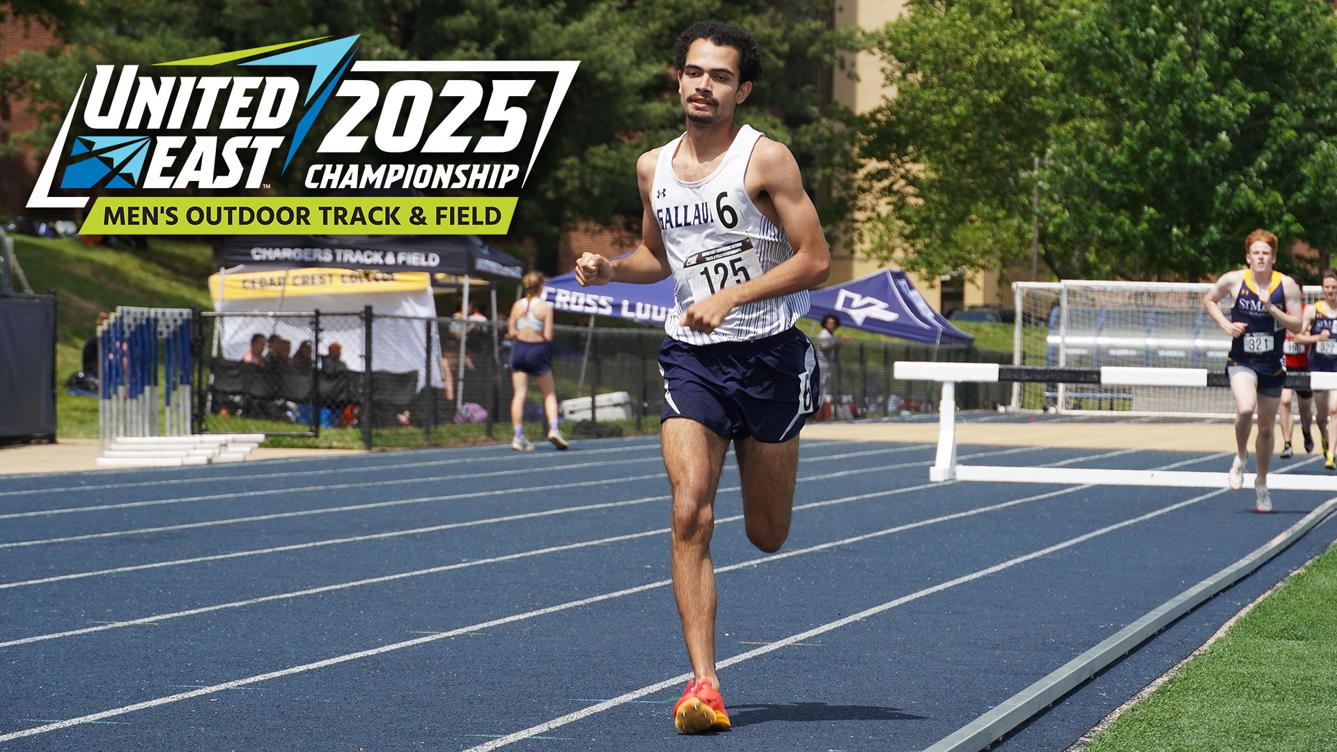 Gallaudet men's track runner Roberto Torres runs in the 3,000-meter steeplechase on a hot and sunny day at the Thomas O. Berg Track in Washington, D.C. 