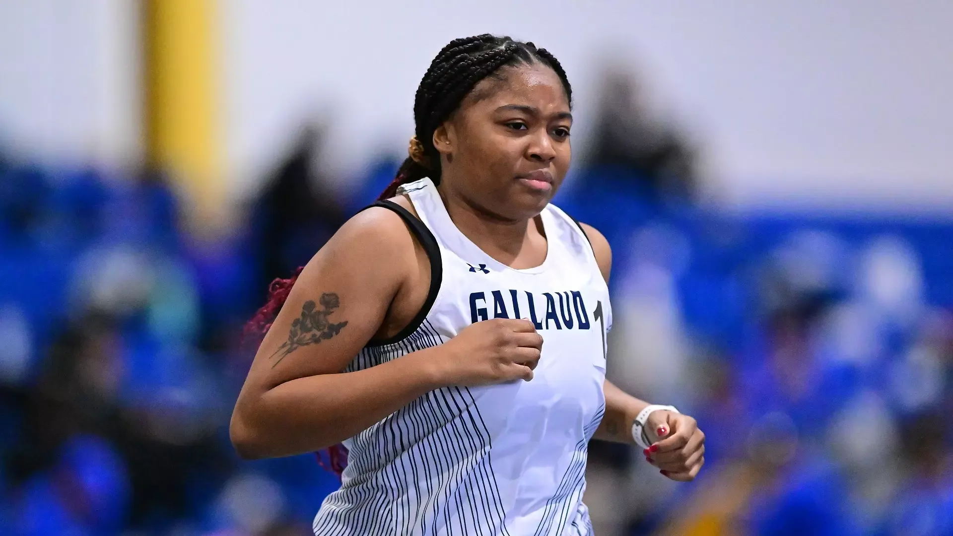Gallaudet women's indoor track and field runner Jala Furdge runs in a meet during the 2026 season.
