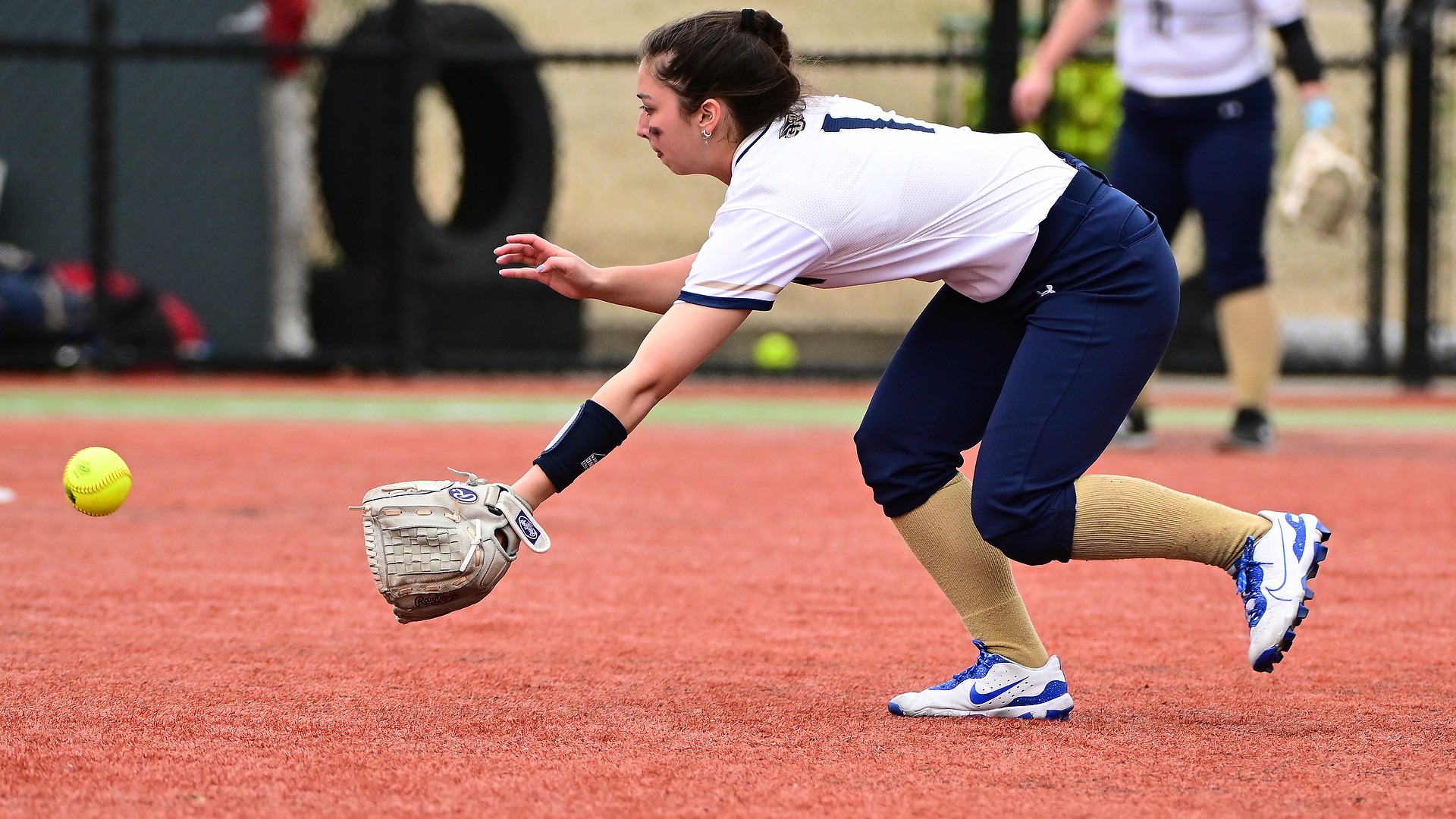 Sammie Howell to attempt to fielding the ball against Sarah Lawrence at home game in GU Softball Complex