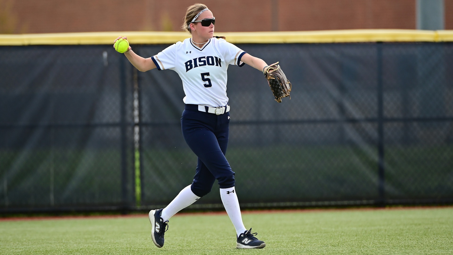 GU softball player Sophia Wascher was attemping to throw the ball after fielding in the outfield at GU Softball Complex