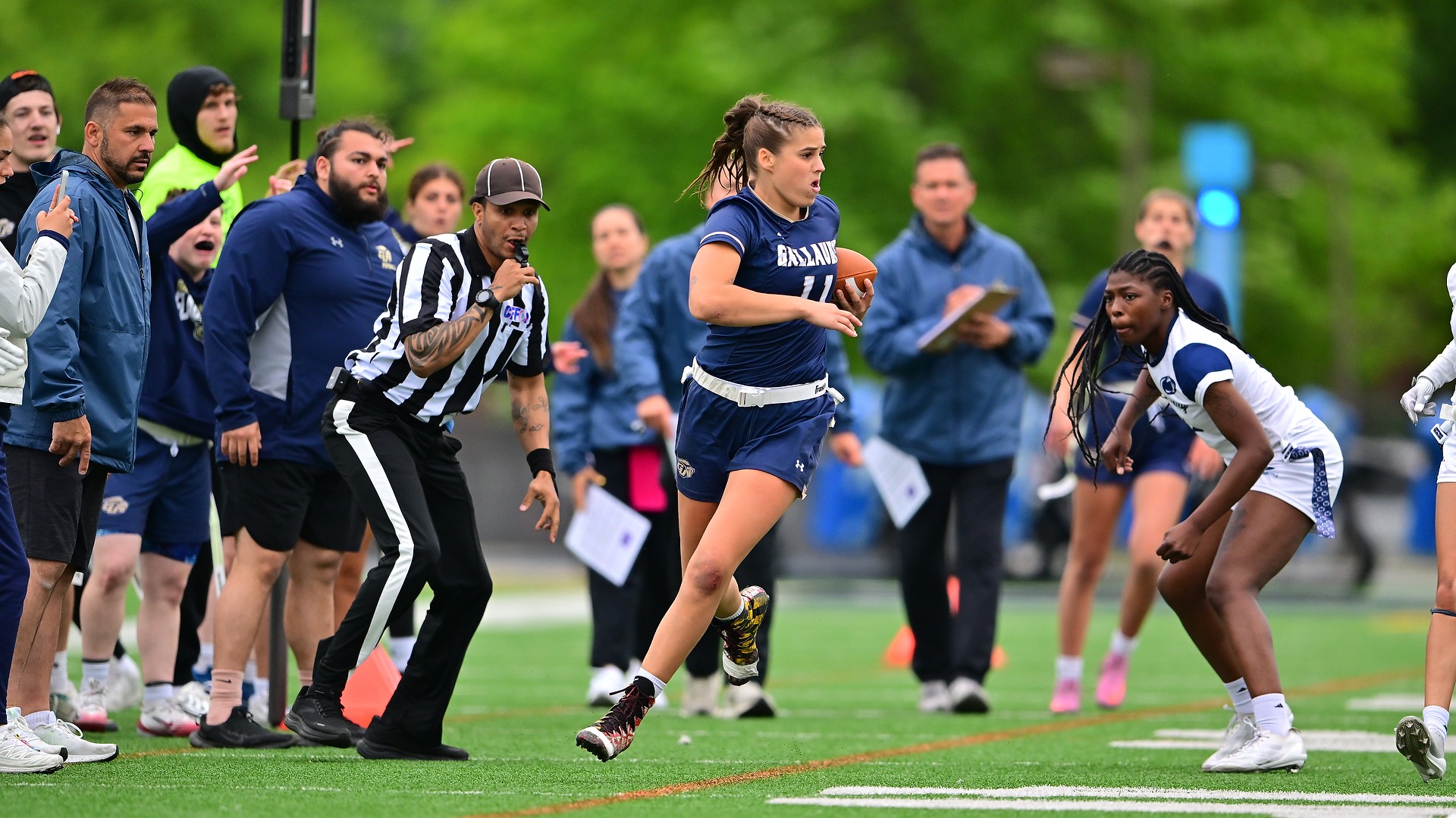 GU Women's Flag Football Citrine Lummer running to step out the out of bound during championship game vs Penn St.-Harrisburg at Hotchkiss Field