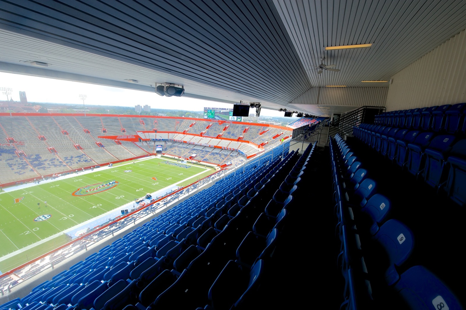 club seats in Ben Hill Griffin Stadium overlook the field from the sidelines