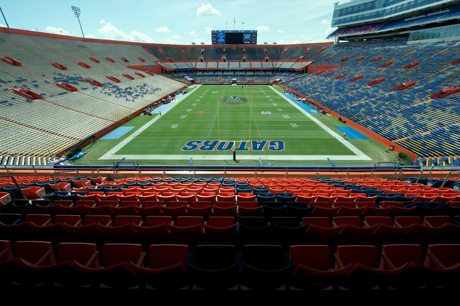 terrace seats in Ben Hill Griffin Stadium overlook the field from behind the north endzone