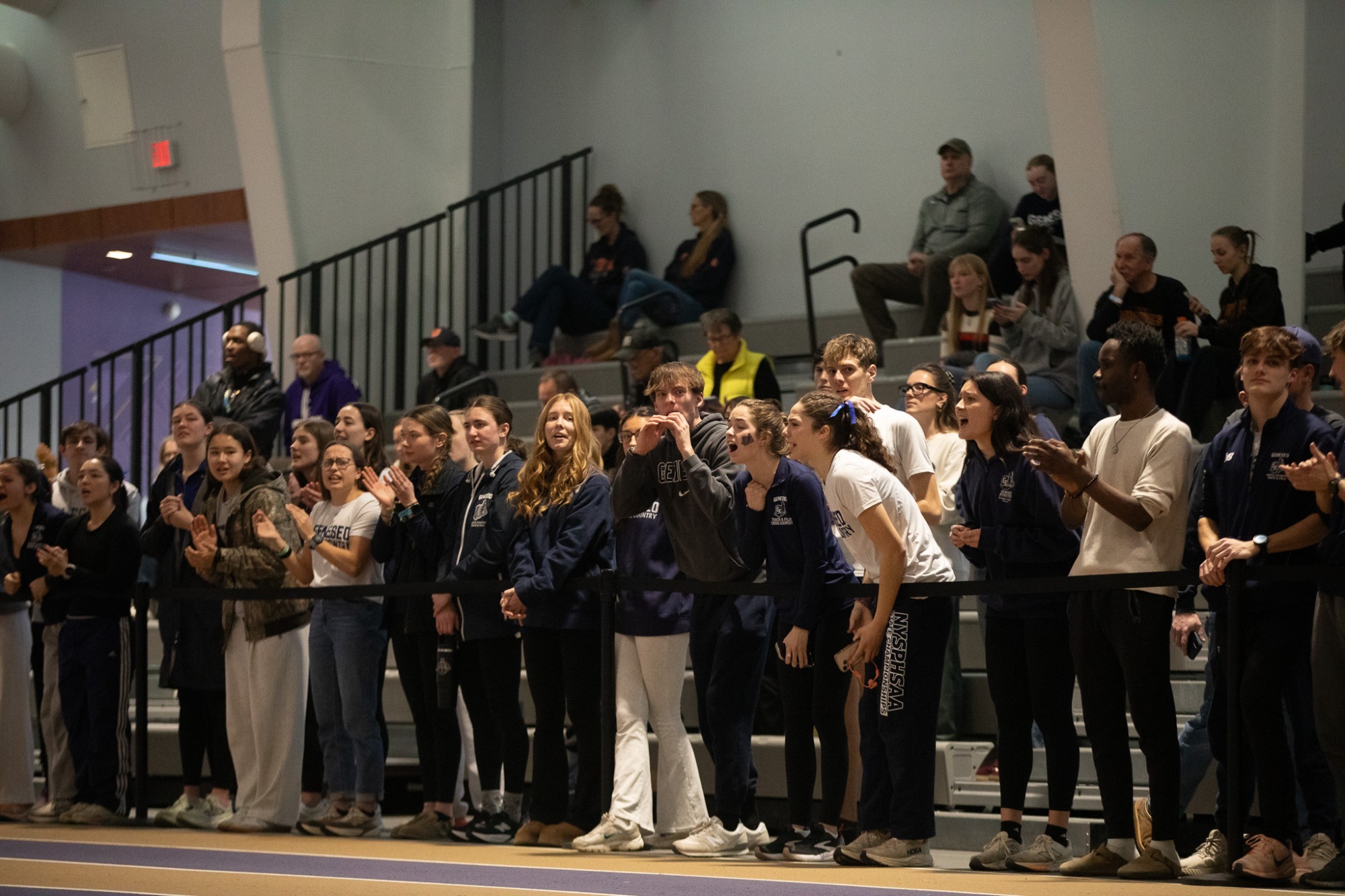 Track and Field cheering at indoor meet