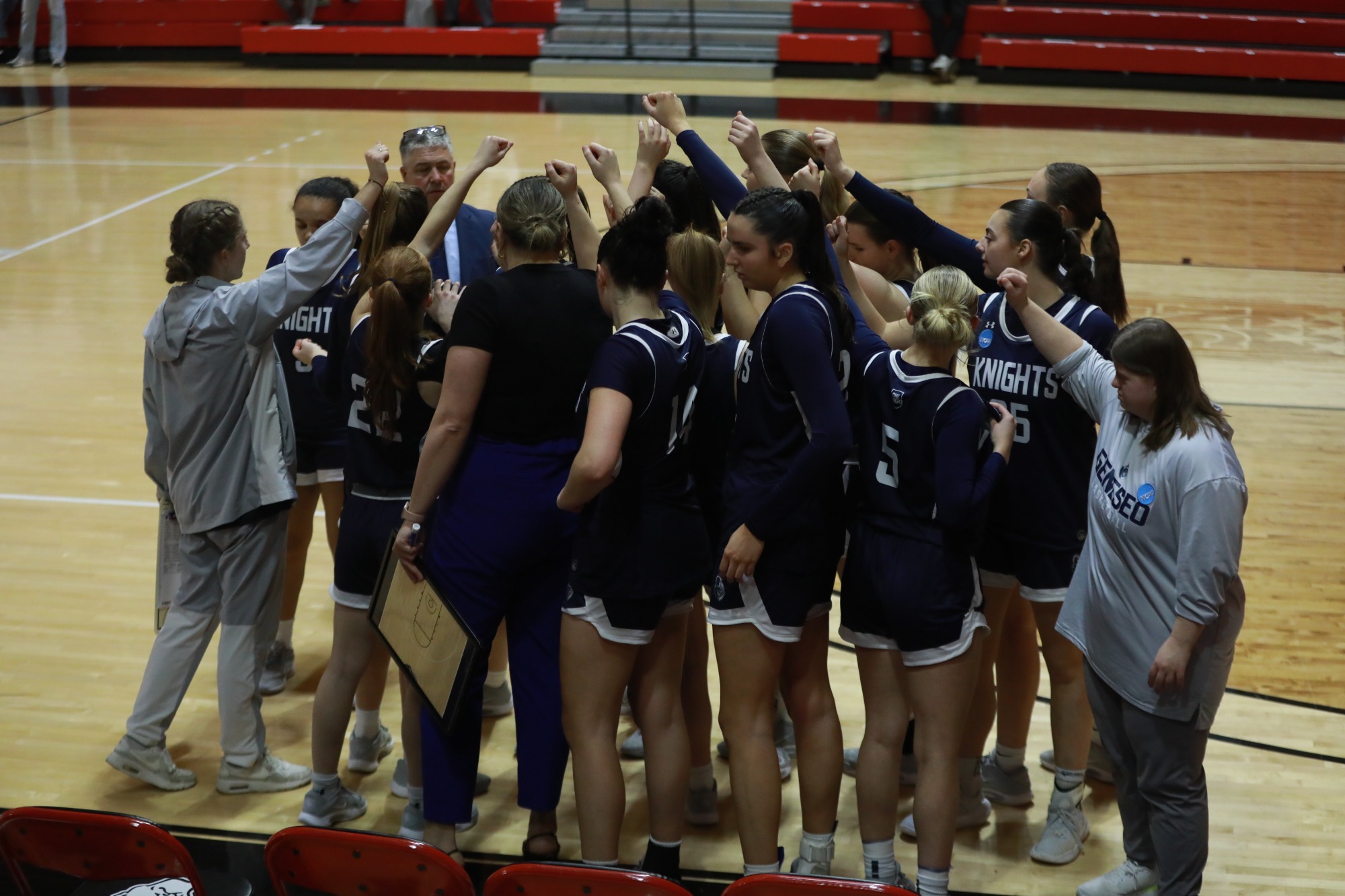 wbb team huddle at ncaa tournament