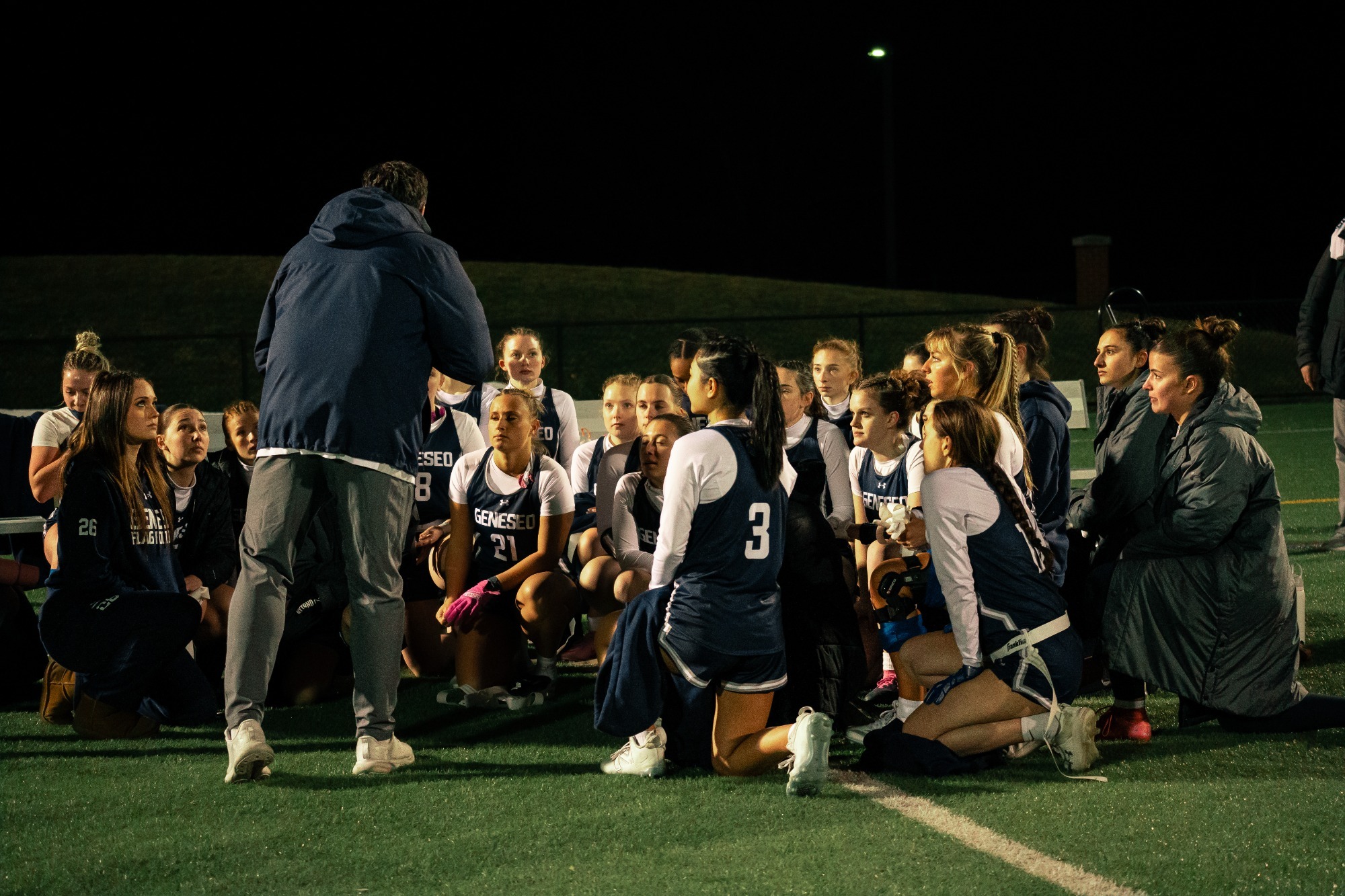 Flag Football Team Huddle