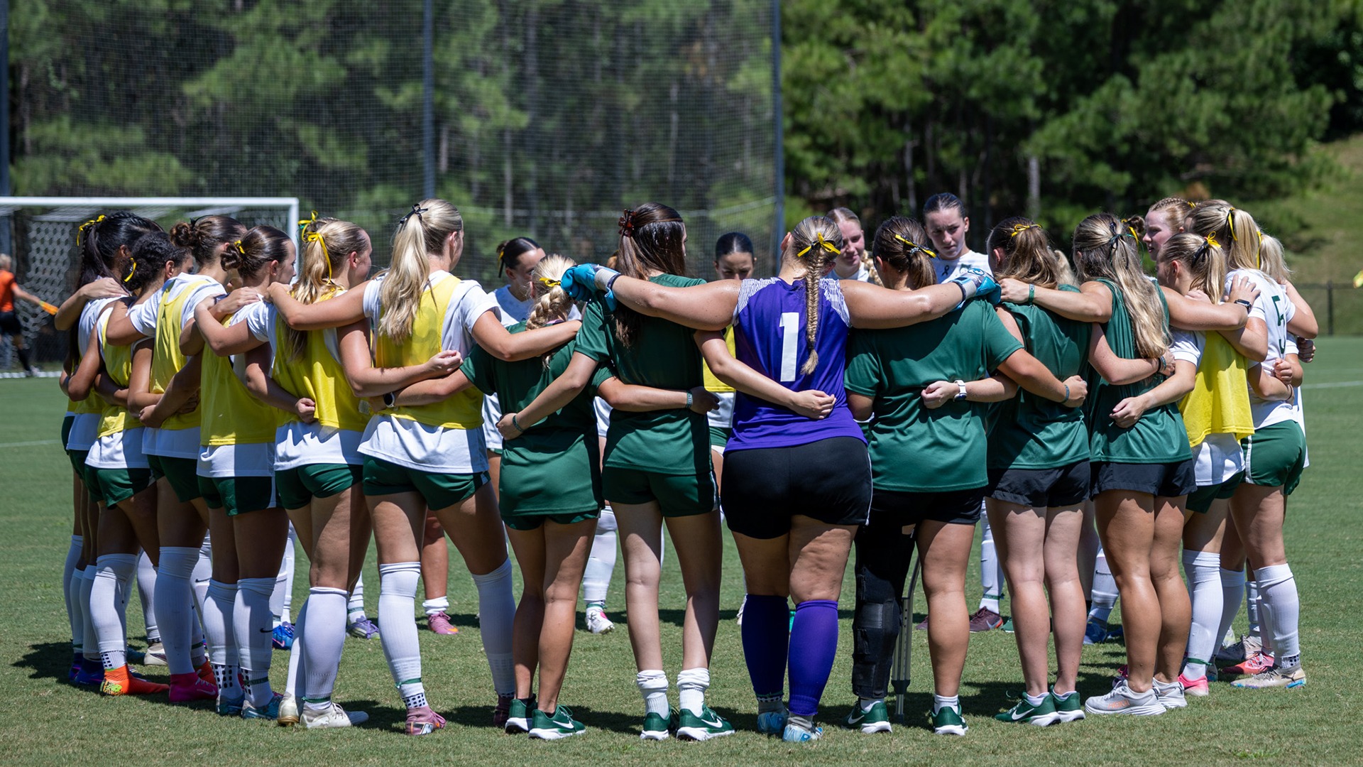 Women's Soccer Team Huddle