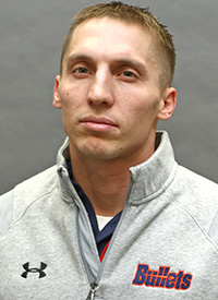 Assistant track and field coach Troy Litten headshot.