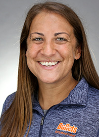 Men's and women's head tennis coach Ali Flores headshot
