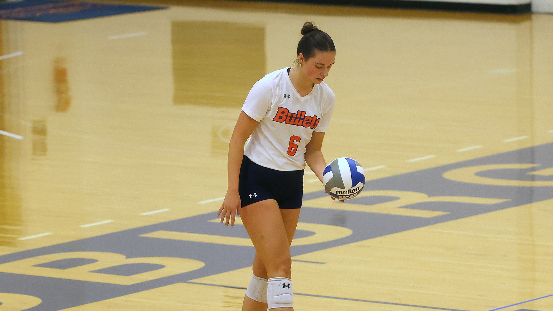 Ellen Manke prepares to serve