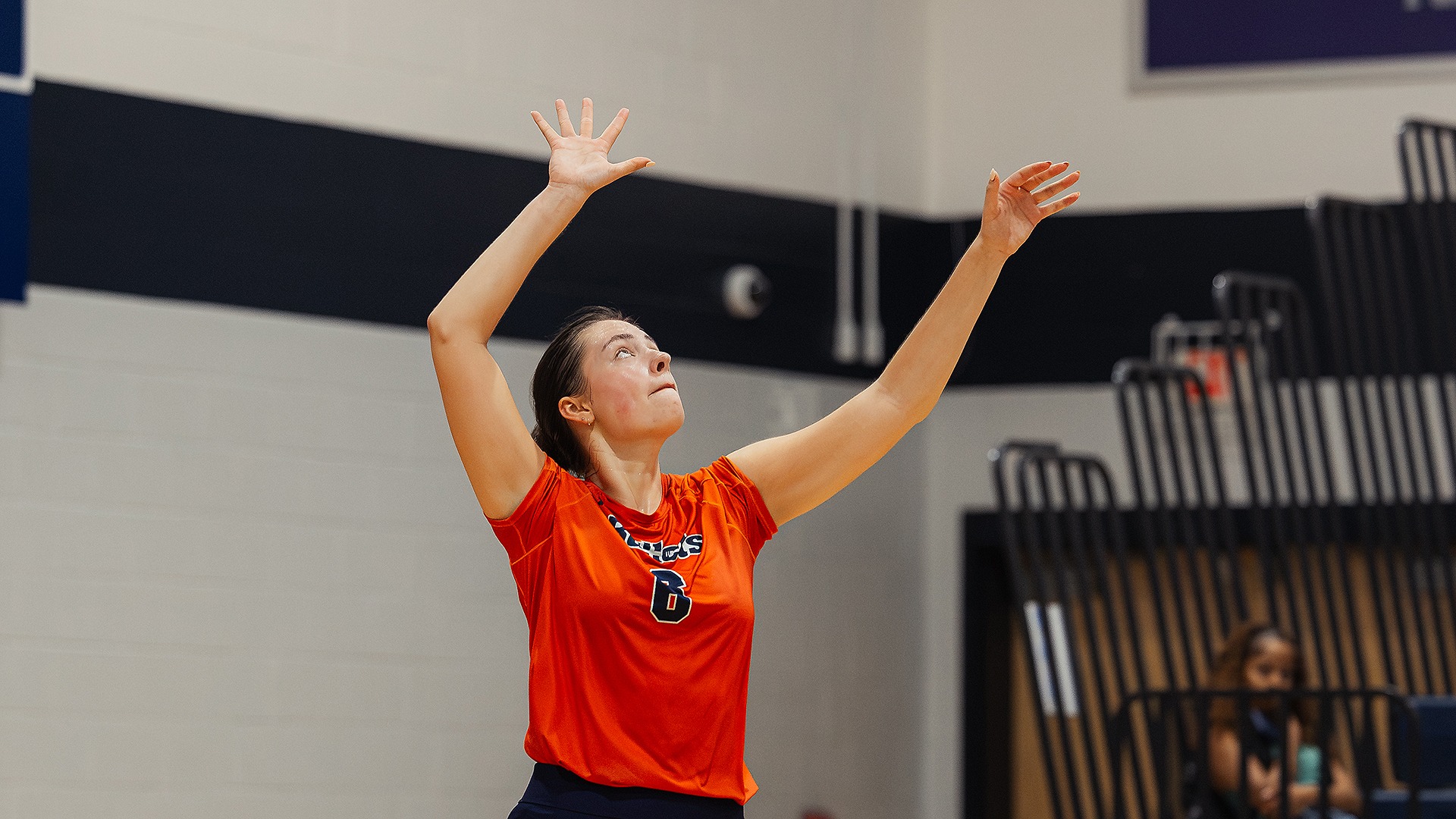 Ellen Manke serves