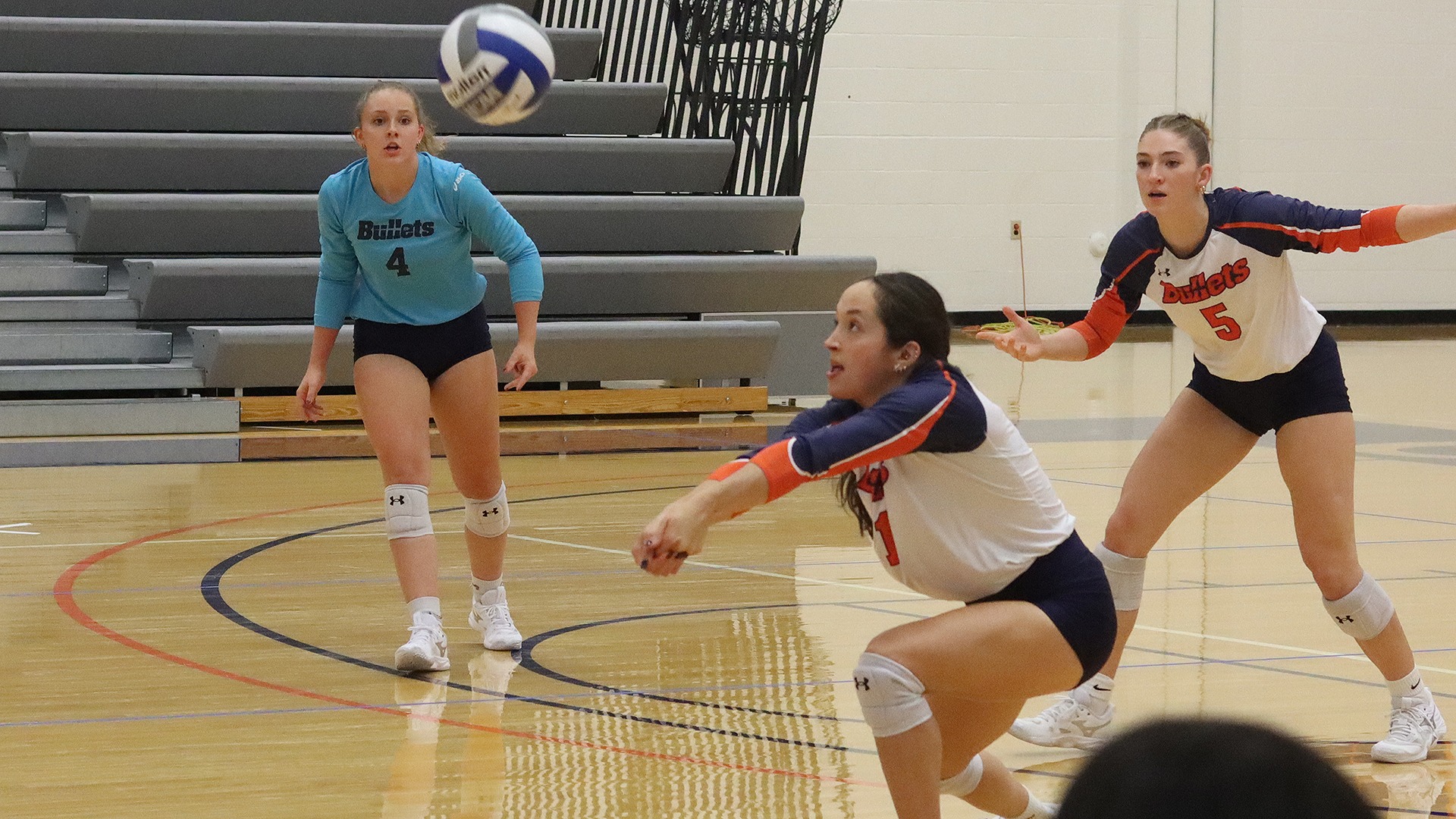 Erin Gonzalez digs a ball