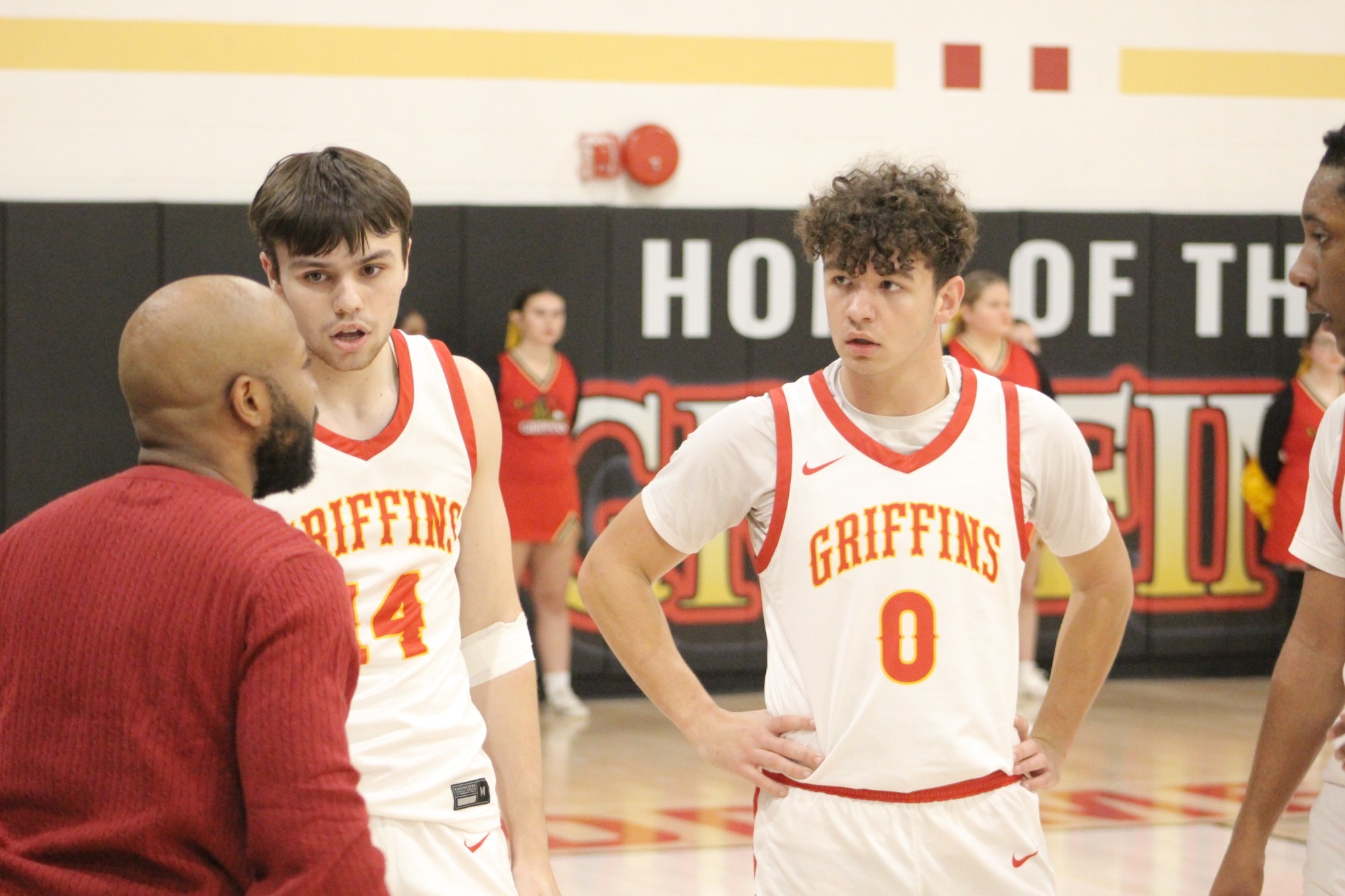 L to R: #14 Jake Okon, Head Coach Darnell Artis '16, #0 Mazen Sayed, #30 Dashon Lewis