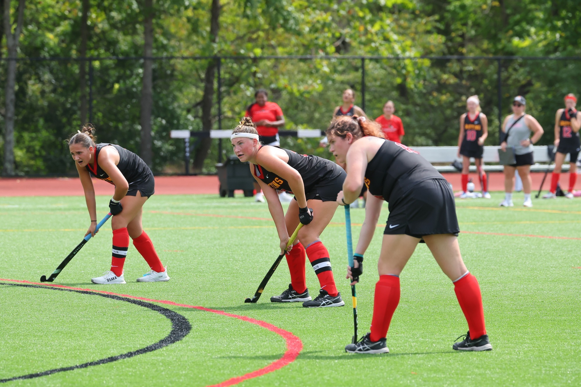 L to R: #3 Gianna Radcliffe, #21 Lillie Uttenreither, #18 Taylor Reynolds