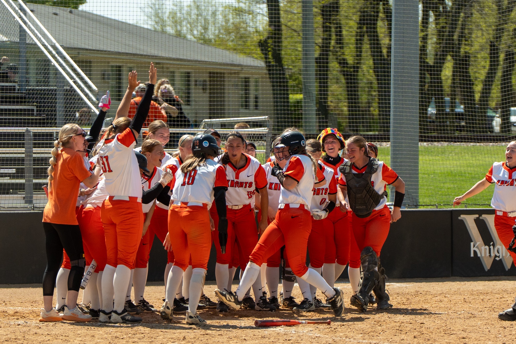 Softball team celebration vs Coe