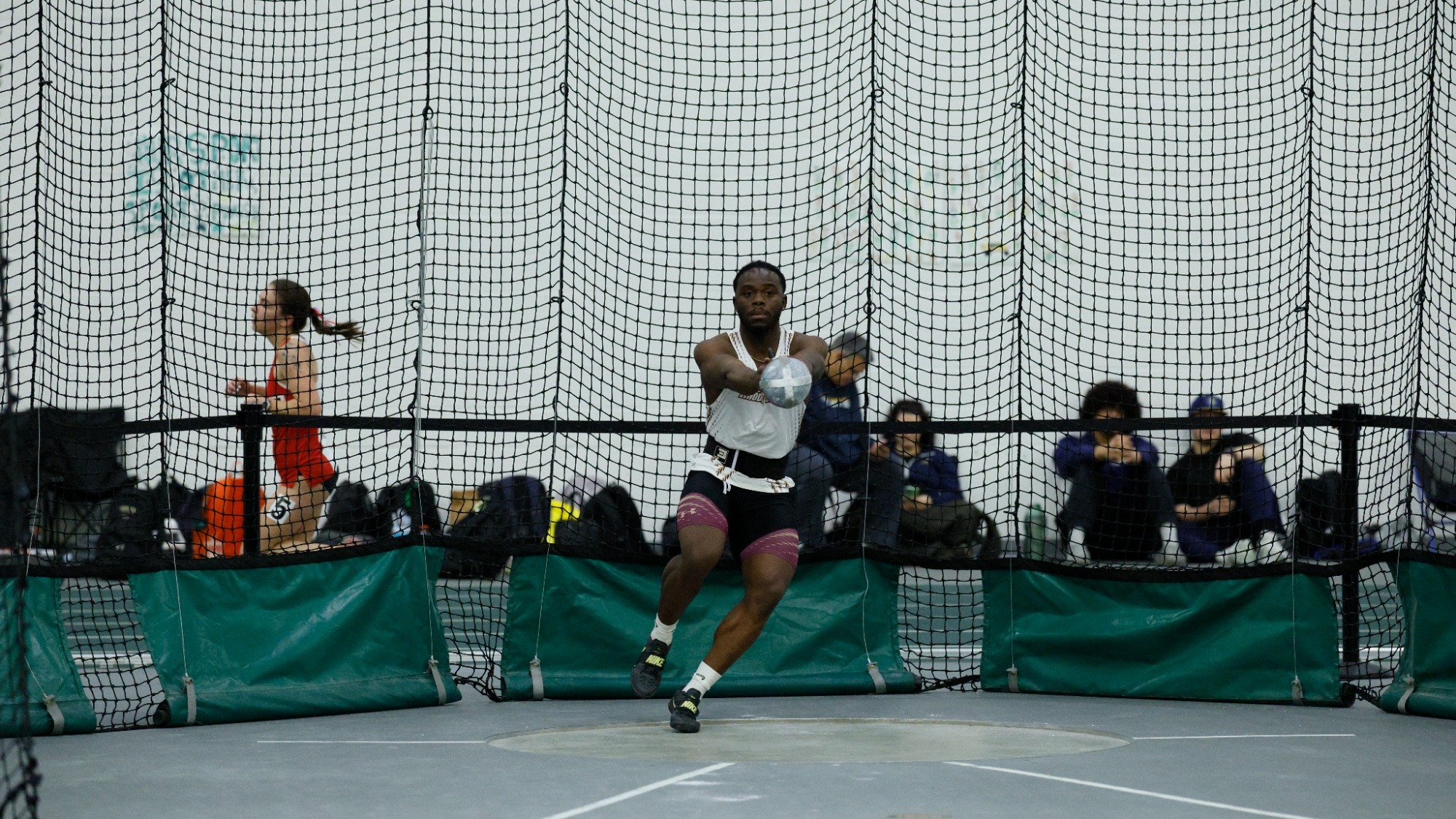 Enrique Edjang in action during the 2025-26 indoor track and field season (weight throw)