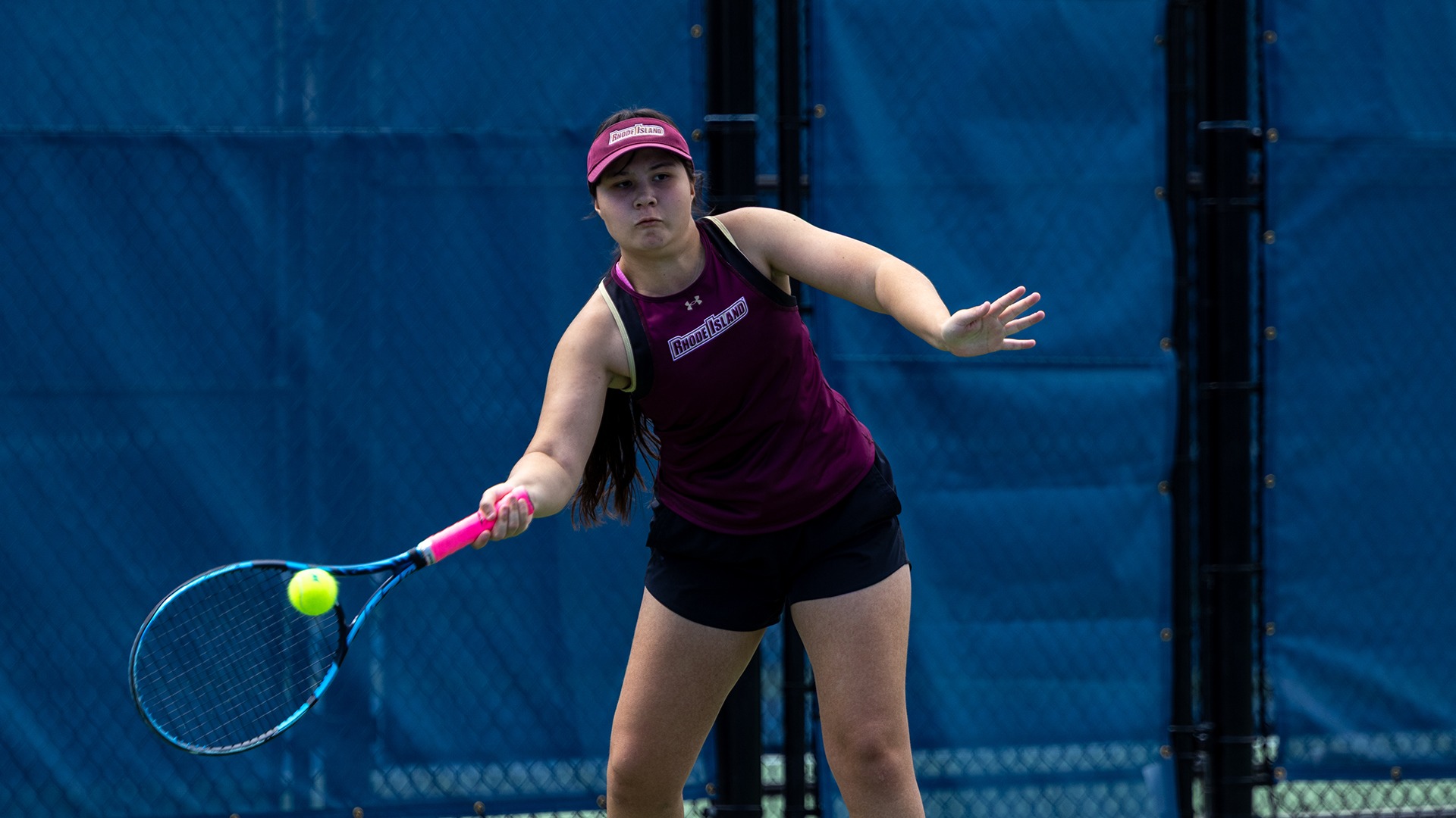 Arianna De Thomas in action during the 2026 NCAA Div. III Women's Tennis Championship