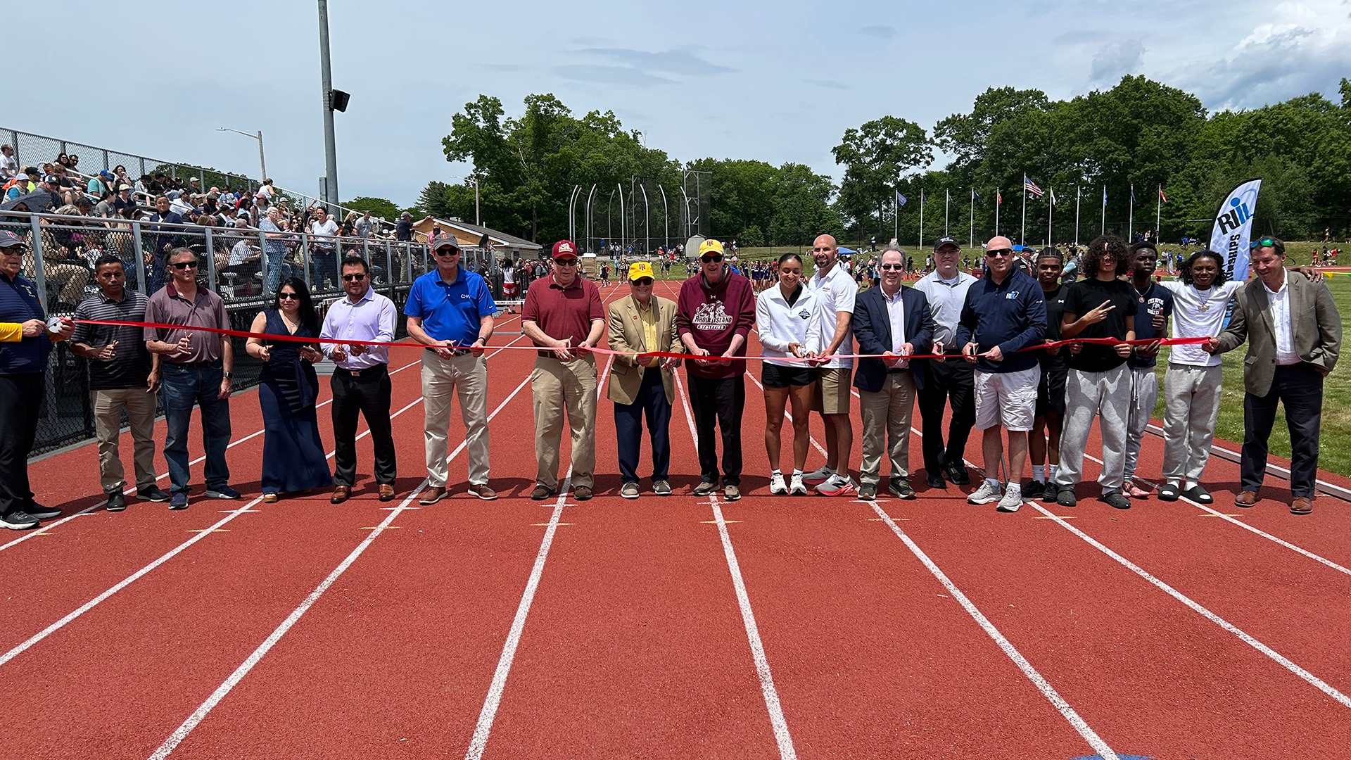 Ribbon Cutting Ceremony Group Photo at RIC Track and Field Dedication