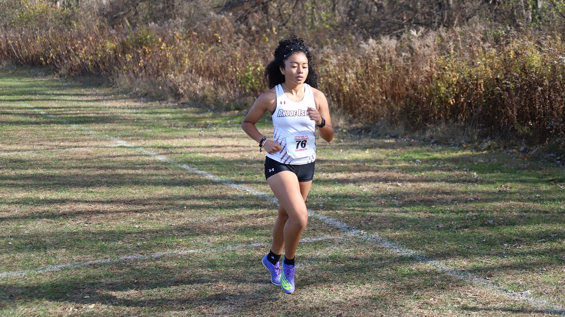 Shirley Portillo in action at the 2025 Little East Women's Cross Country Championship