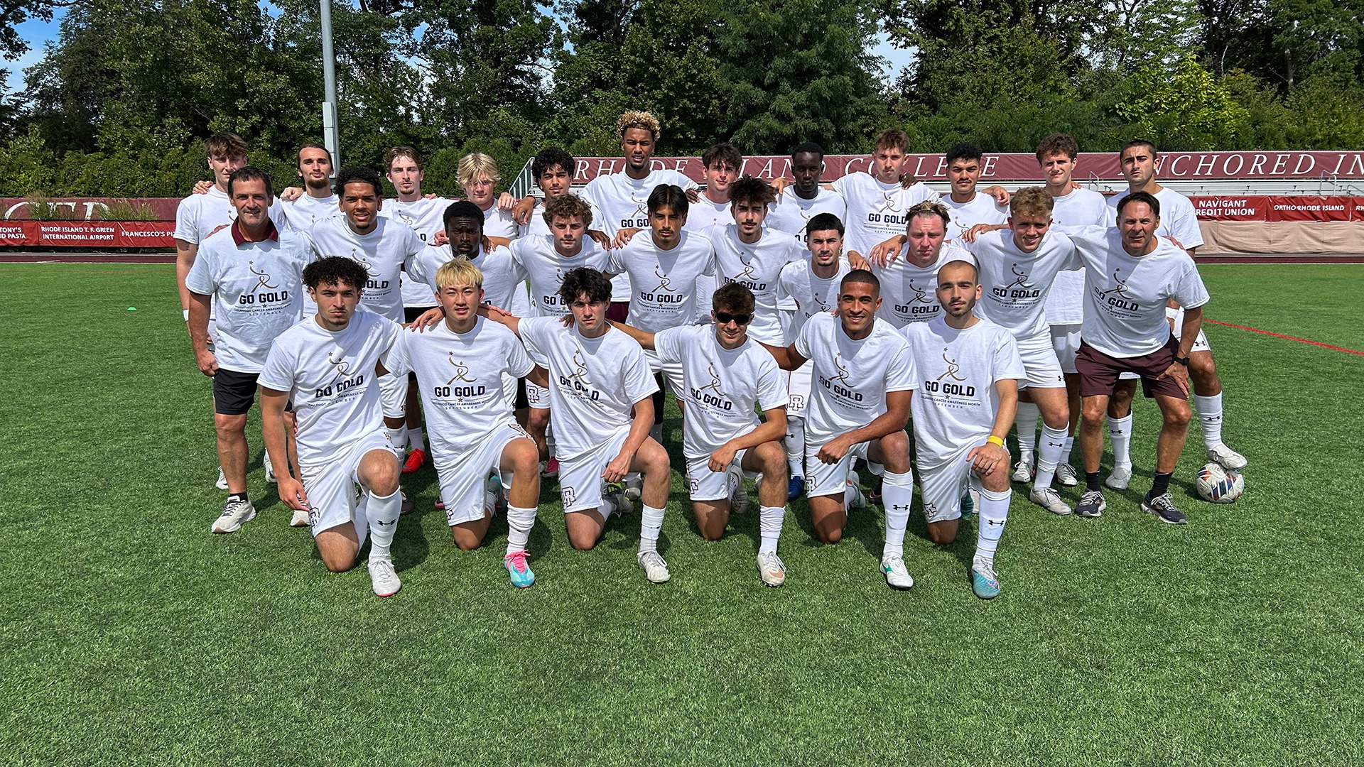 Men's Soccer Team Photo wearing Childhood Cancer Month T-Shirts
