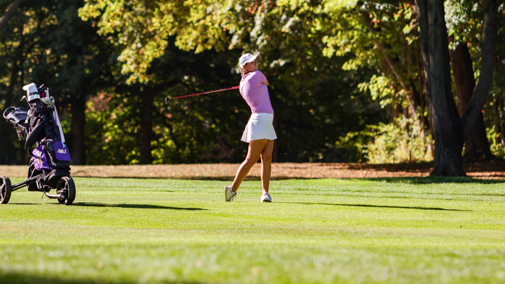 Riley 2025-26 WGOLF fall action shot