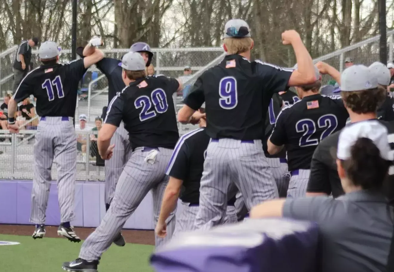 Ashland University baseball players celebrate during Game 1 against Lake Erie on April 3 at Donges Field.