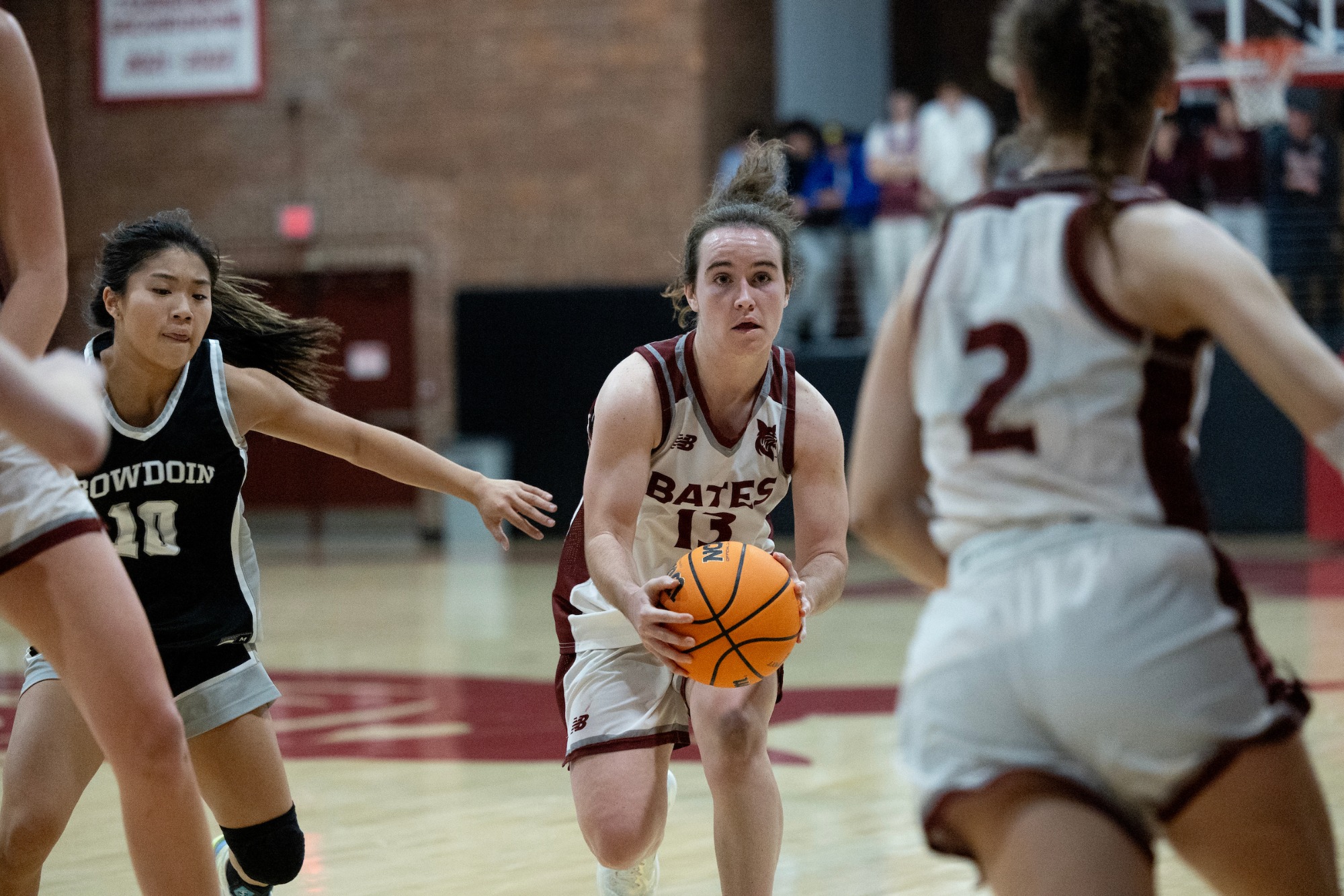 Junior guard Sarah Hughes delivered a moment the Alumni Gym crowd won't soon forget, drilling a half-court heave at the buzzer to force double overtime, but the No. 11 Bates women's basketball team fell just short in a 77–70 battle against No. 6 Bowdoin on Thursday night. It marked Bates' first double-overtime game since an 86–85 win over the University of New England on November 25, 2018.