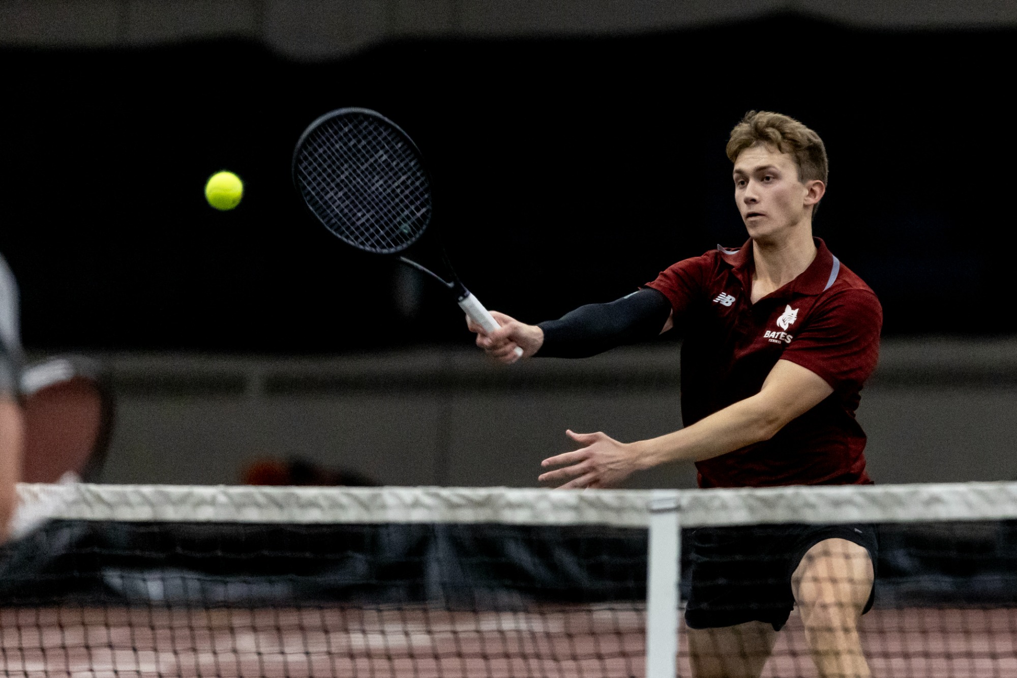 Men's_Tennis plays a match against Wesleyan in Merrill Gymnasium on April 13, 2025. Three seniors pose with Coach Paul Gastonguay ’89 before warmups.