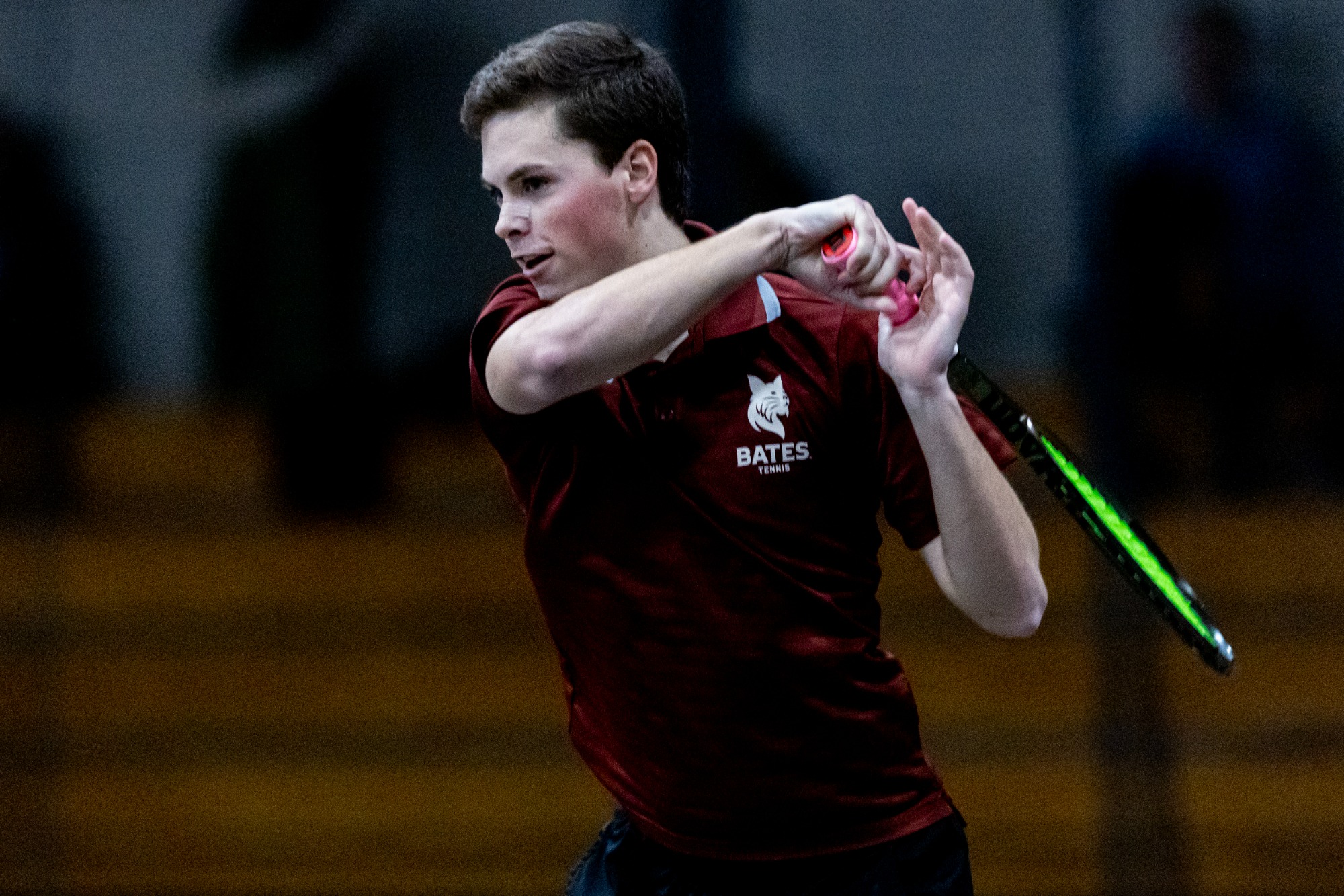 Men's_Tennis plays a match against Wesleyan in Merrill Gymnasium on April 13, 2025. Three seniors pose with Coach Paul Gastonguay ’89 before warmups.